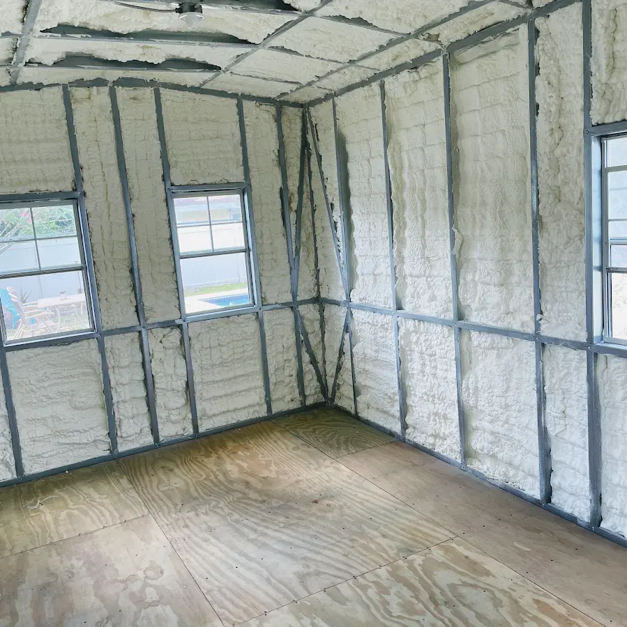 Closed-cell spray foam insulation applied to wall cavities in a residential project in Gallatin